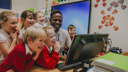 Teacher-children-laughing-146225489-web-1500px.jpg